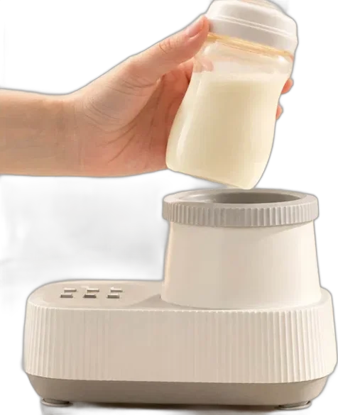 The Minbie Waterless Warmer with a bottle of milk